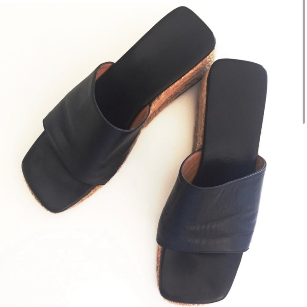 Yves Saint Laurent slip on sandals.